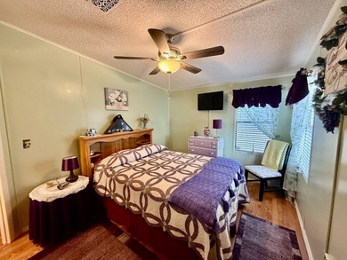 Home is located in Water Oak Country Club Estates, an active 55 on Water Oak Country Club Estates in Florida - for sale on GolfHomes.com, golf home, golf lot