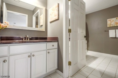 Welcome to this stunning renovated three-level end unit on New Jersey National Golf Club in New Jersey - for sale on GolfHomes.com, golf home, golf lot