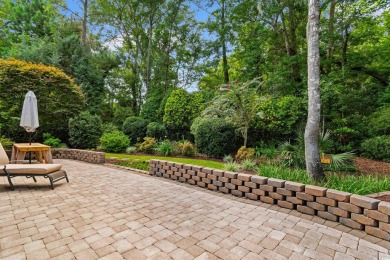 This gorgeous brick residence in sought-after Pawleys Island, SC on Pawleys Plantation Golf and Country Club in South Carolina - for sale on GolfHomes.com, golf home, golf lot