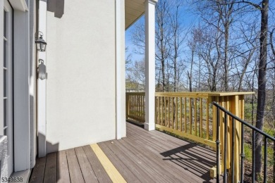 Welcome to this stunning renovated three-level end unit on New Jersey National Golf Club in New Jersey - for sale on GolfHomes.com, golf home, golf lot