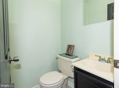 This spacious 3-level townhome is nestled in the sought-after on Bay Hills Golf Club in Maryland - for sale on GolfHomes.com, golf home, golf lot