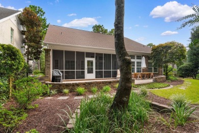 This gorgeous brick residence in sought-after Pawleys Island, SC on Pawleys Plantation Golf and Country Club in South Carolina - for sale on GolfHomes.com, golf home, golf lot