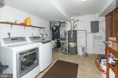 This spacious 3-level townhome is nestled in the sought-after on Bay Hills Golf Club in Maryland - for sale on GolfHomes.com, golf home, golf lot