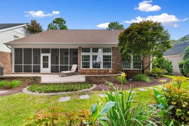 This gorgeous brick residence in sought-after Pawleys Island, SC on Pawleys Plantation Golf and Country Club in South Carolina - for sale on GolfHomes.com, golf home, golf lot