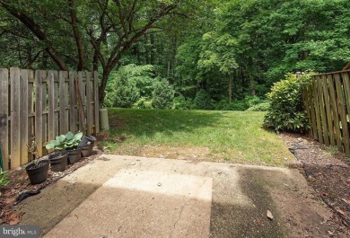 This spacious 3-level townhome is nestled in the sought-after on Bay Hills Golf Club in Maryland - for sale on GolfHomes.com, golf home, golf lot