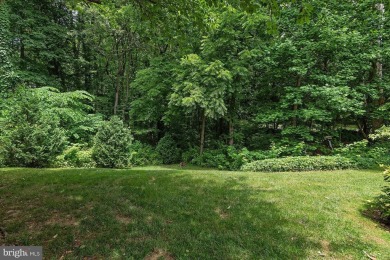 This spacious 3-level townhome is nestled in the sought-after on Bay Hills Golf Club in Maryland - for sale on GolfHomes.com, golf home, golf lot