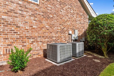 This gorgeous brick residence in sought-after Pawleys Island, SC on Pawleys Plantation Golf and Country Club in South Carolina - for sale on GolfHomes.com, golf home, golf lot