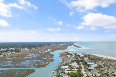 This gorgeous brick residence in sought-after Pawleys Island, SC on Pawleys Plantation Golf and Country Club in South Carolina - for sale on GolfHomes.com, golf home, golf lot