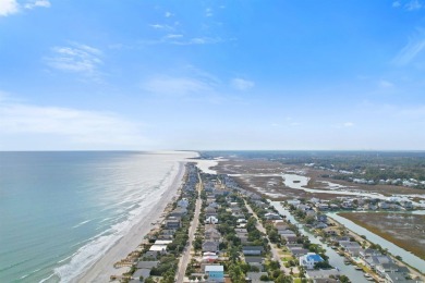 This gorgeous brick residence in sought-after Pawleys Island, SC on Pawleys Plantation Golf and Country Club in South Carolina - for sale on GolfHomes.com, golf home, golf lot