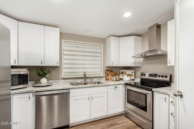 Remodeled by owner, wood like flooring,new white kitchen built on SunBird Golf Club in Arizona - for sale on GolfHomes.com, golf home, golf lot
