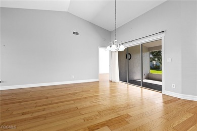 This one is truly a rare find-featuring beautiful hardwood on Sabal Springs Golf and Racquet Club in Florida - for sale on GolfHomes.com, golf home, golf lot