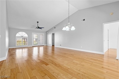 This one is truly a rare find-featuring beautiful hardwood on Sabal Springs Golf and Racquet Club in Florida - for sale on GolfHomes.com, golf home, golf lot