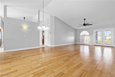 This one is truly a rare find-featuring beautiful hardwood on Sabal Springs Golf and Racquet Club in Florida - for sale on GolfHomes.com, golf home, golf lot