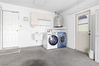 This one is truly a rare find-featuring beautiful hardwood on Sabal Springs Golf and Racquet Club in Florida - for sale on GolfHomes.com, golf home, golf lot