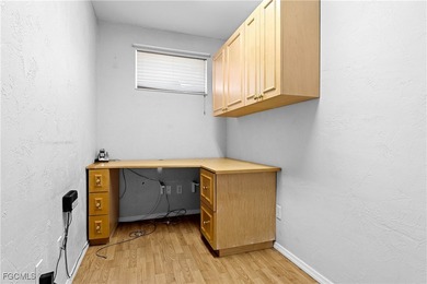 This one is truly a rare find-featuring beautiful hardwood on Sabal Springs Golf and Racquet Club in Florida - for sale on GolfHomes.com, golf home, golf lot