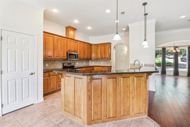 Stop the car this home has it all! Beautiful and spotless clean on Pecan Plantation Country Club in Texas - for sale on GolfHomes.com, golf home, golf lot