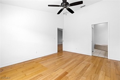 This one is truly a rare find-featuring beautiful hardwood on Sabal Springs Golf and Racquet Club in Florida - for sale on GolfHomes.com, golf home, golf lot