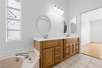 This one is truly a rare find-featuring beautiful hardwood on Sabal Springs Golf and Racquet Club in Florida - for sale on GolfHomes.com, golf home, golf lot