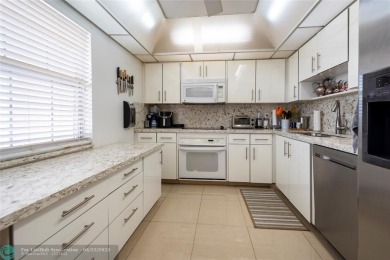 THIS 3 BEDROOM/ 2.5 BATH UNIT OFFERS COMFORTABLE LIVING AT A on Palm-Aire Country Club and Resort - Palms in Florida - for sale on GolfHomes.com, golf home, golf lot