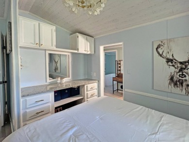 Beautifully remodeled, this 2 bedroom 2 bath park home is on The Great Outdoors Golf and Country Club in Florida - for sale on GolfHomes.com, golf home, golf lot