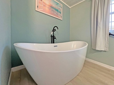 Beautifully remodeled, this 2 bedroom 2 bath park home is on The Great Outdoors Golf and Country Club in Florida - for sale on GolfHomes.com, golf home, golf lot
