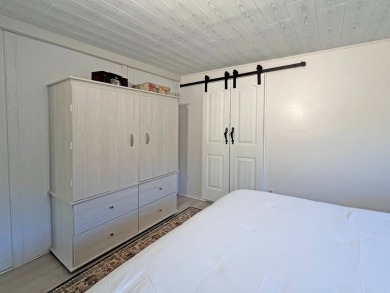 Beautifully remodeled, this 2 bedroom 2 bath park home is on The Great Outdoors Golf and Country Club in Florida - for sale on GolfHomes.com, golf home, golf lot