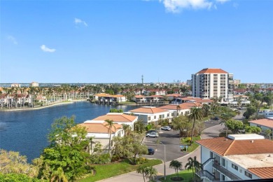 Intracoastal Water and City Views Await You from Your 7th-Floor on Isla Del Sol Yacht and Country Club in Florida - for sale on GolfHomes.com, golf home, golf lot