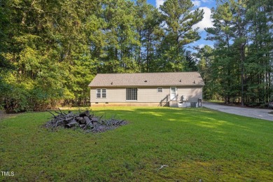 Welcome to your dream home opportunity in coveted Lake Royale! on River Golf and County Club at Lake Royale in North Carolina - for sale on GolfHomes.com, golf home, golf lot