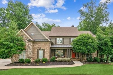 Welcome to Traditions of Braselton, enjoy a beautiful drive thru on Traditions of Braselton Golf Club in Georgia - for sale on GolfHomes.com, golf home, golf lot