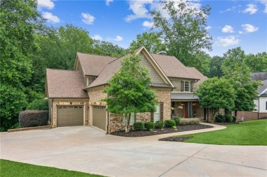 Welcome to Traditions of Braselton, enjoy a beautiful drive thru on Traditions of Braselton Golf Club in Georgia - for sale on GolfHomes.com, golf home, golf lot