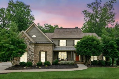 Welcome to Traditions of Braselton, enjoy a beautiful drive thru on Traditions of Braselton Golf Club in Georgia - for sale on GolfHomes.com, golf home, golf lot
