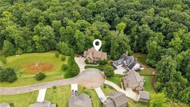Welcome to Traditions of Braselton, enjoy a beautiful drive thru on Traditions of Braselton Golf Club in Georgia - for sale on GolfHomes.com, golf home, golf lot