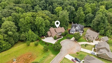 Welcome to Traditions of Braselton, enjoy a beautiful drive thru on Traditions of Braselton Golf Club in Georgia - for sale on GolfHomes.com, golf home, golf lot