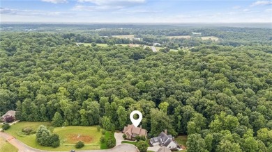 Welcome to Traditions of Braselton, enjoy a beautiful drive thru on Traditions of Braselton Golf Club in Georgia - for sale on GolfHomes.com, golf home, golf lot