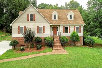 Centrally located in Sanford, this beautiful home is in the on Carolina Trace Country Club in North Carolina - for sale on GolfHomes.com, golf home, golf lot