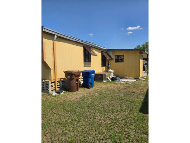 This home is located in the 55+ mobile home community of Anglers on Anglers Green Golf Course in Florida - for sale on GolfHomes.com, golf home, golf lot