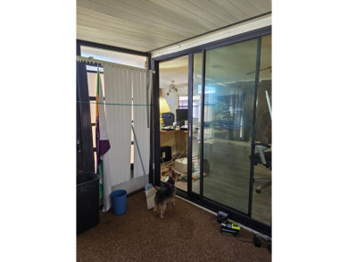 This home is located in the 55+ mobile home community of Anglers on Anglers Green Golf Course in Florida - for sale on GolfHomes.com, golf home, golf lot