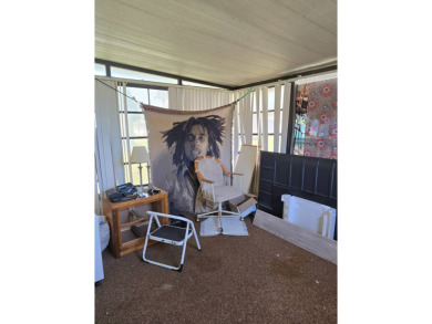 This home is located in the 55+ mobile home community of Anglers on Anglers Green Golf Course in Florida - for sale on GolfHomes.com, golf home, golf lot