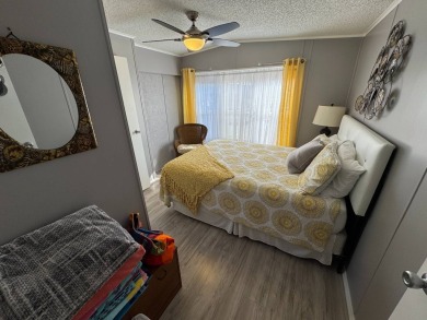 ***JUST REDUCED***This 2/2 1045 sq ft home is beautifully on Lake Henry Golf Club in Florida - for sale on GolfHomes.com, golf home, golf lot