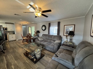 ***JUST REDUCED***This 2/2 1045 sq ft home is beautifully on Lake Henry Golf Club in Florida - for sale on GolfHomes.com, golf home, golf lot