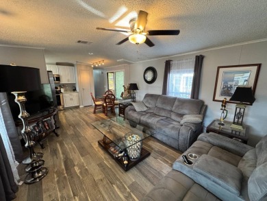 ***JUST REDUCED***This 2/2 1045 sq ft home is beautifully on Lake Henry Golf Club in Florida - for sale on GolfHomes.com, golf home, golf lot