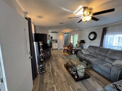 ***JUST REDUCED***This 2/2 1045 sq ft home is beautifully on Lake Henry Golf Club in Florida - for sale on GolfHomes.com, golf home, golf lot