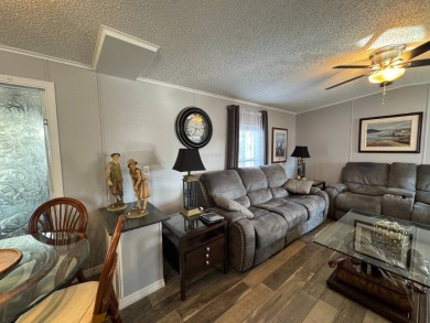 ***JUST REDUCED***This 2/2 1045 sq ft home is beautifully on Lake Henry Golf Club in Florida - for sale on GolfHomes.com, golf home, golf lot