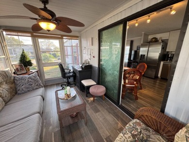 ***JUST REDUCED***This 2/2 1045 sq ft home is beautifully on Lake Henry Golf Club in Florida - for sale on GolfHomes.com, golf home, golf lot