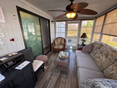 ***JUST REDUCED***This 2/2 1045 sq ft home is beautifully on Lake Henry Golf Club in Florida - for sale on GolfHomes.com, golf home, golf lot