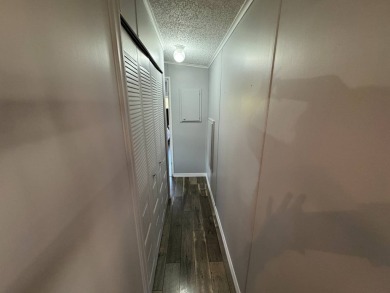 ***JUST REDUCED***This 2/2 1045 sq ft home is beautifully on Lake Henry Golf Club in Florida - for sale on GolfHomes.com, golf home, golf lot