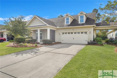 This warm and inviting single-level townhome, that has a wide on Savannah Quarters Country Club in Georgia - for sale on GolfHomes.com, golf home, golf lot