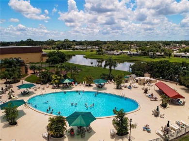 Welcome to your perfect slice of paradise in the heart of Kings on Kings Point Executive Golf Course in Florida - for sale on GolfHomes.com, golf home, golf lot