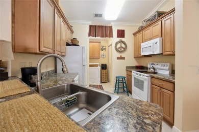 Between the sixes! This lovely TURN KEY (completely furnished) 2 on The Links of Spruce Creek in Florida - for sale on GolfHomes.com, golf home, golf lot
