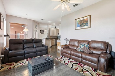 Welcome to 204 Golf Course Parkway, where comfort meets relaxed on Ridgewood Lakes Golf and Country Club in Florida - for sale on GolfHomes.com, golf home, golf lot